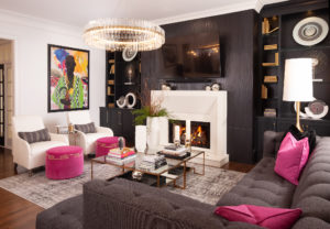 oversized black sectional is the perfect backdrop for pink pillows