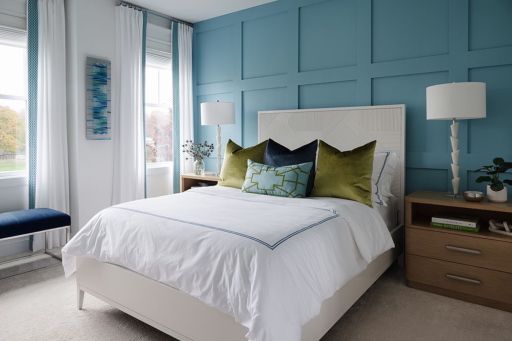 Bright coastal colors create a gem of a luxury bedroom.